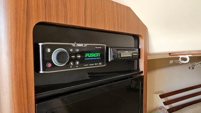  Yacht Photos Pics Fusion stereo system in 2016 Grady-White Express 330 cabin interior.