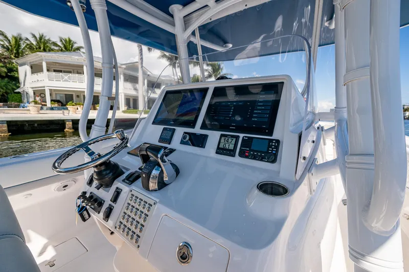  Yacht Photos Pics 2019 Intrepid 400 boat dashboard with advanced navigation controls and dual screens.