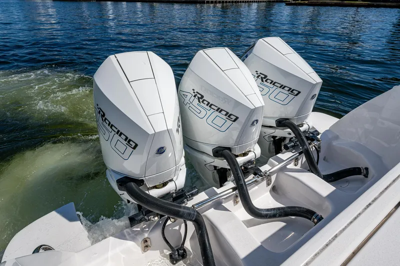  Yacht Photos Pics Triple Mercury Racing 450 outboard engines on a 2019 Intrepid 400 boat, cruising on water.