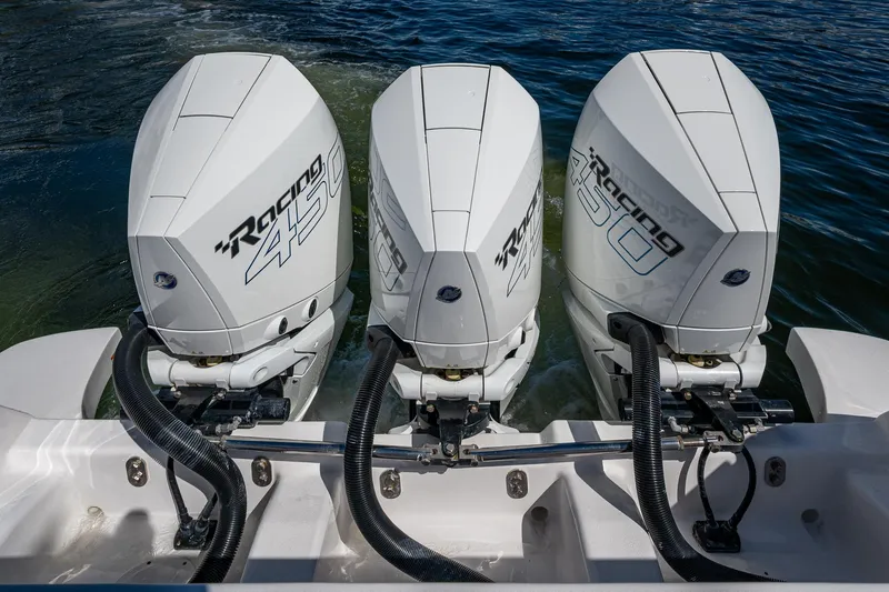  Yacht Photos Pics Triple outboard engines on a 2019 Intrepid 400 boat, featuring powerful Mercury Racing motors.