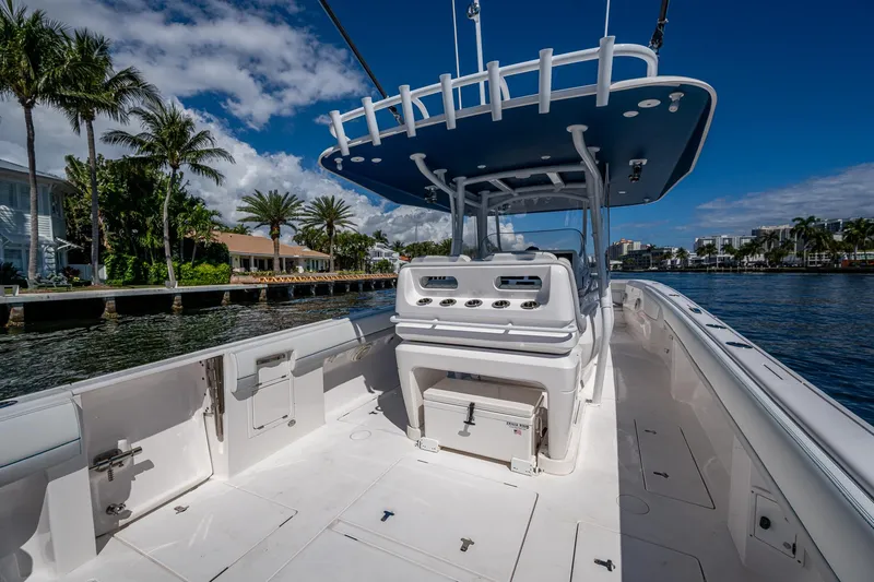  Yacht Photos Pics 2019 Intrepid 400 boat on water, featuring spacious deck and modern console.