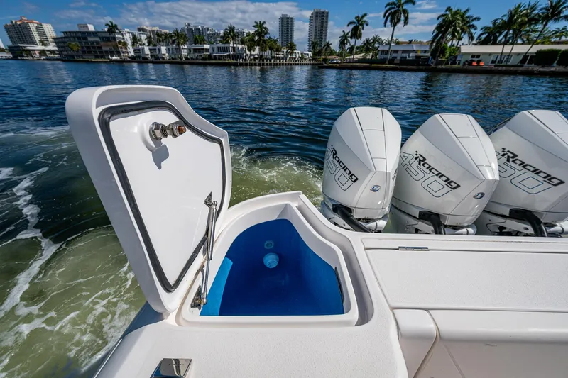  Yacht Photos Pics 2019 Intrepid 400 boat with open storage compartment and powerful outboard engines.