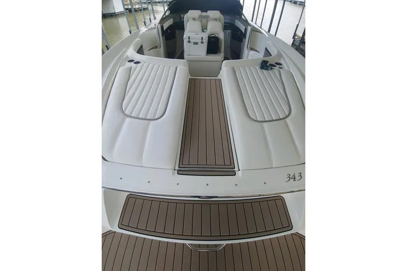  Yacht Photos Pics 2004 Cobalt 343 boat with sleek white and brown deck design.