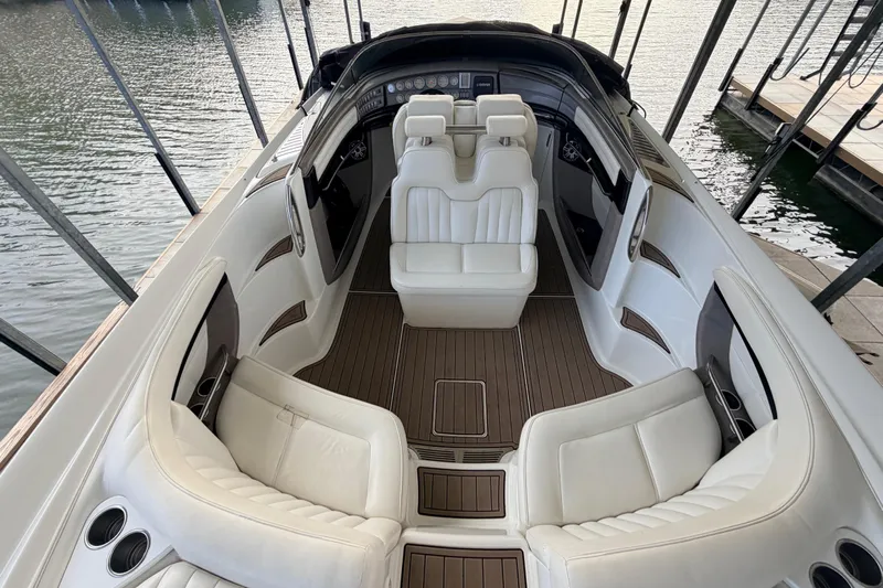  Yacht Photos Pics Luxurious interior of a 2004 Cobalt 343 boat with white seating and wood accents.