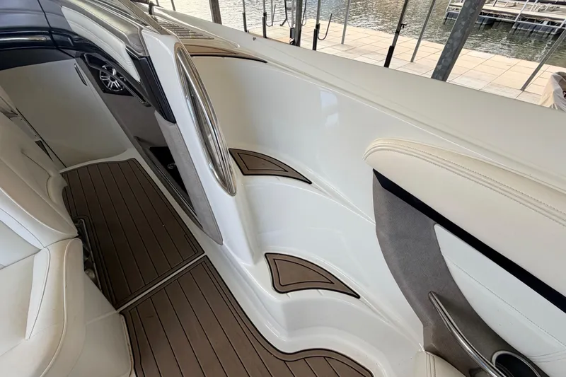  Yacht Photos Pics Interior of a 2004 Cobalt 343 boat with sleek white and wood accents.