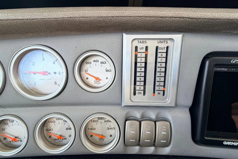  Yacht Photos Pics Dashboard of a 2004 Cobalt 343 with gauges and control panel.