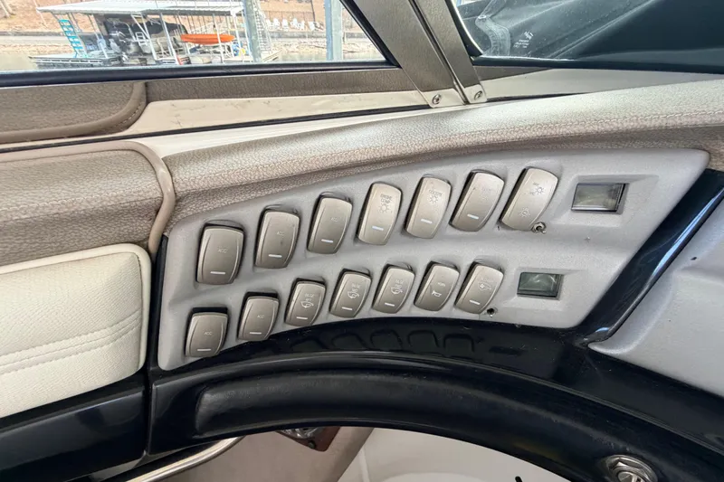  Yacht Photos Pics Control panel of a 2004 Cobalt 343 boat with multiple switches.