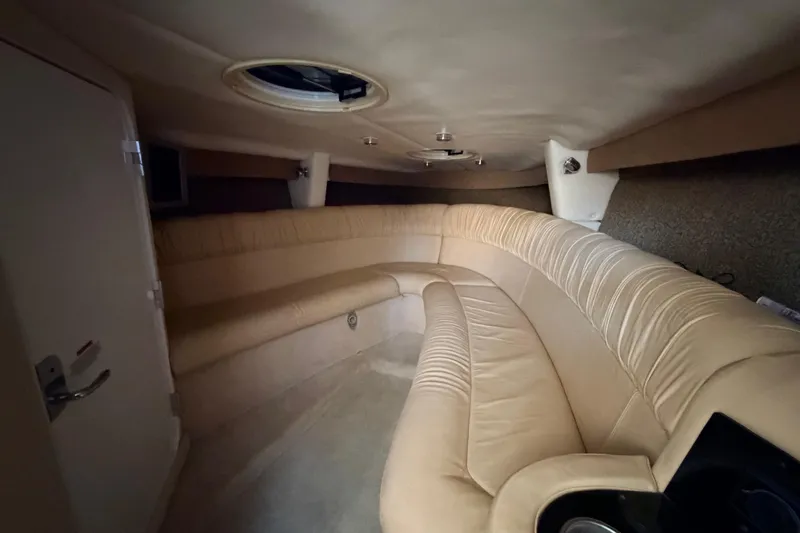  Yacht Photos Pics Luxurious interior of a 2004 Cobalt 343 boat with beige seating.