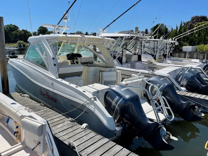  Yacht Photos Pics 2016 World Cat 320 DC boat docked with twin Yamaha outboard engines.
