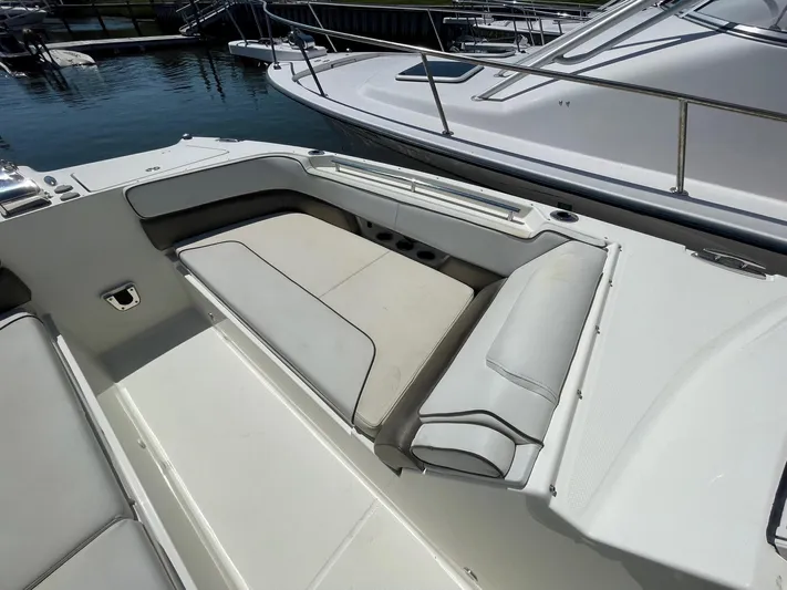  Yacht Photos Pics 2016 World Cat 320 DC boat with spacious seating area and sleek design.