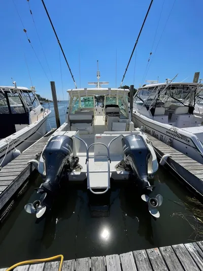  Yacht Photos Pics 2016 World Cat 320 DC boat docked with twin engines.