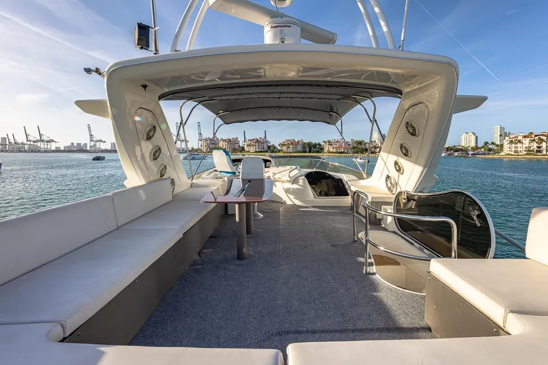 "pony Up" Yacht Photos Pics Luxurious 2003 Azimut Fly 68 yacht interior with spacious seating and ocean view.