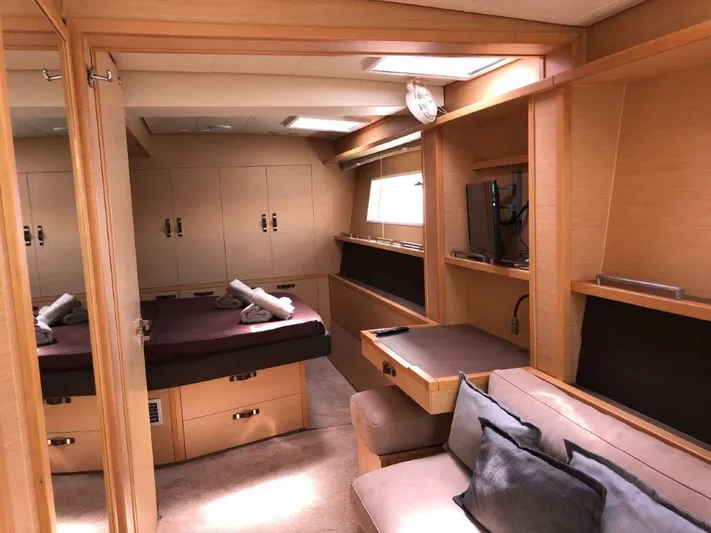  Yacht Photos Pics Luxurious interior of 2015 Lagoon 620 yacht with cozy bedroom and modern amenities.