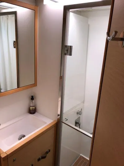  Yacht Photos Pics Bathroom interior of 2015 Lagoon 620 yacht with sink and shower.