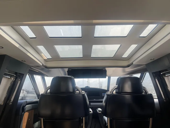 Blade Yacht Photos Pics Interior of a 2007 Pantera 80 GT yacht with skylights and leather seating.