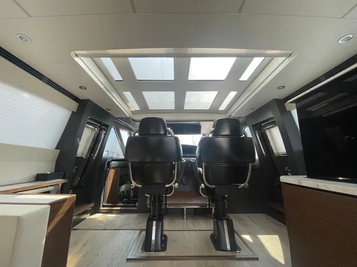 Blade Yacht Photos Pics Luxurious interior of a 2007 Pantera 80 GT yacht with modern seating and skylights.