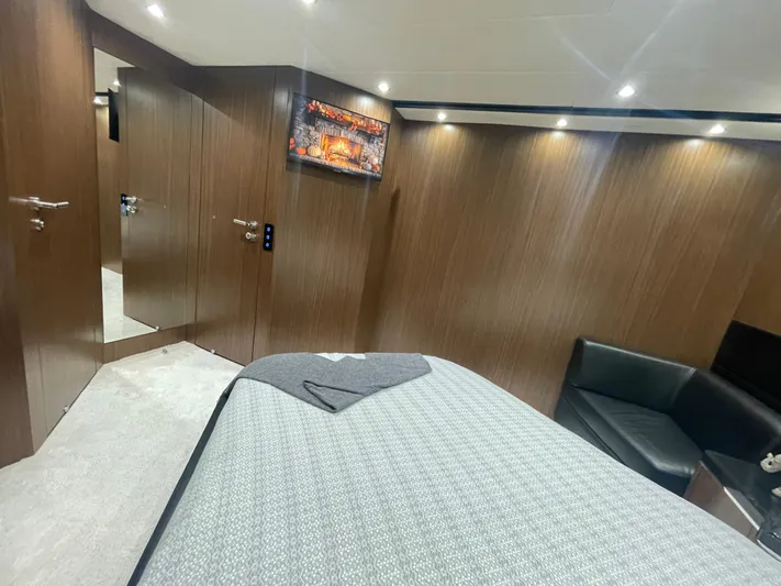 Blade Yacht Photos Pics Luxurious interior of 2007 Pantera 80 GT yacht with modern wood paneling and ambient lighting.