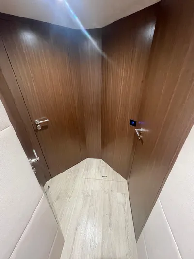 Blade Yacht Photos Pics Wood-paneled interior of a 2007 Pantera 80 GT yacht with modern design elements.