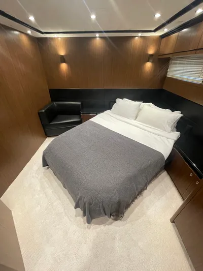 Blade Yacht Photos Pics Luxurious bedroom interior in 2007 Pantera 80 GT yacht, featuring cozy bed and modern decor.