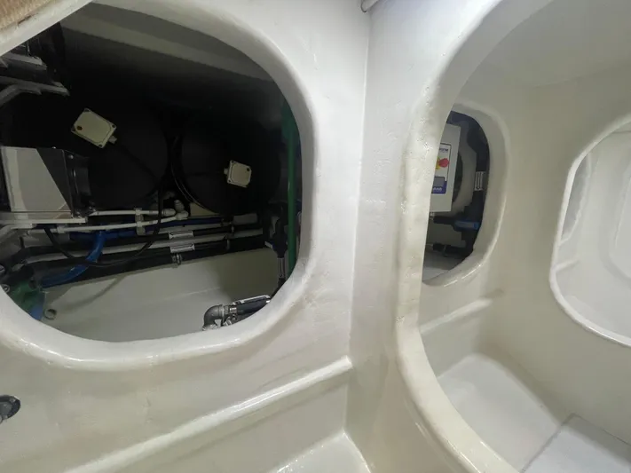 Blade Yacht Photos Pics Interior view of 2007 Pantera 80 GT engine compartment with visible components and wiring.