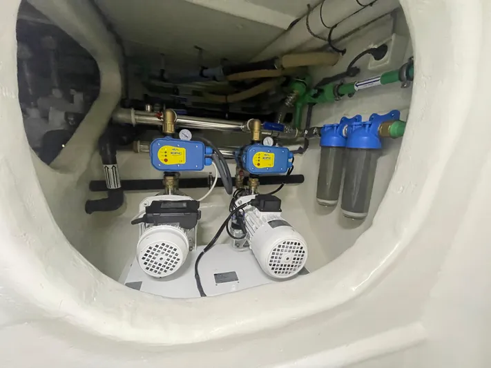 Blade Yacht Photos Pics Engine room of 2007 Pantera 80 GT with mechanical components and filters.