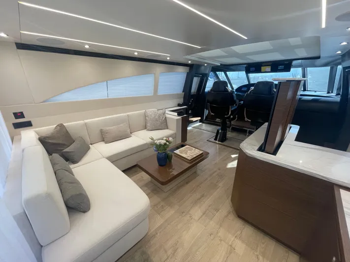 Blade Yacht Photos Pics Luxurious yacht interior with modern seating, wooden flooring, and helm station, Pantera 80 GT 2007.