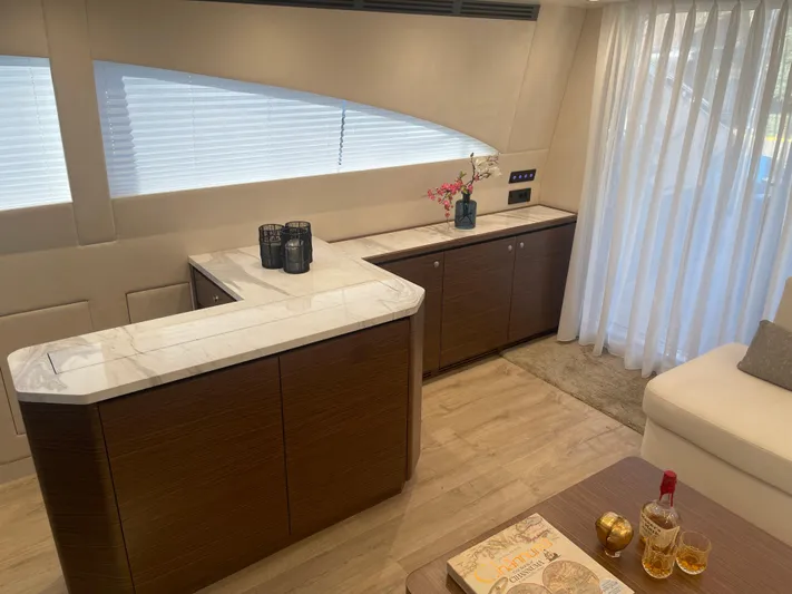 Blade Yacht Photos Pics Luxurious interior of a 2007 Pantera 80 GT yacht with elegant wood and marble finishes.