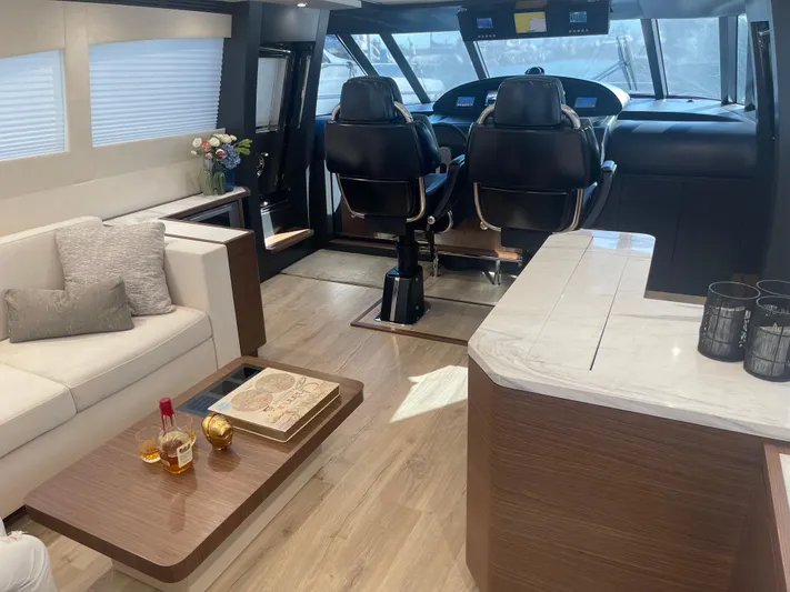 Blade Yacht Photos Pics Luxurious interior of a 2007 Pantera 80 GT yacht with modern seating and elegant decor.