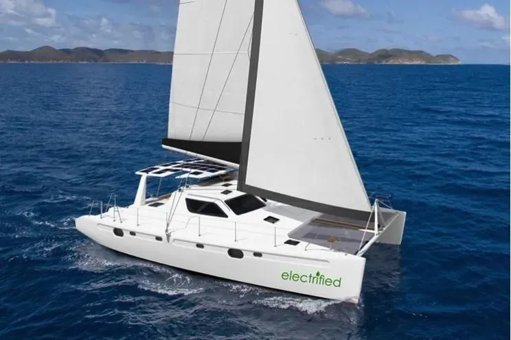 Electrify Yacht Photos Pics Sailing catamaran Voyage Yachts 480E 2018 on open sea with "electrified" branding.