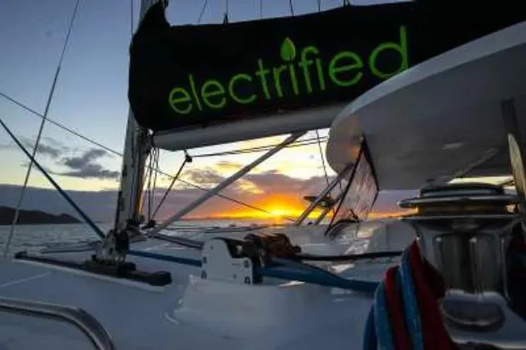Electrify Yacht Photos Pics Sunset view from Voyage Yachts 480E sailboat, featuring "electrified" sail.