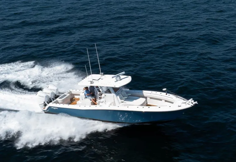  Yacht Photos Pics 2023 Invincible 36 Open boat cruising on open water.