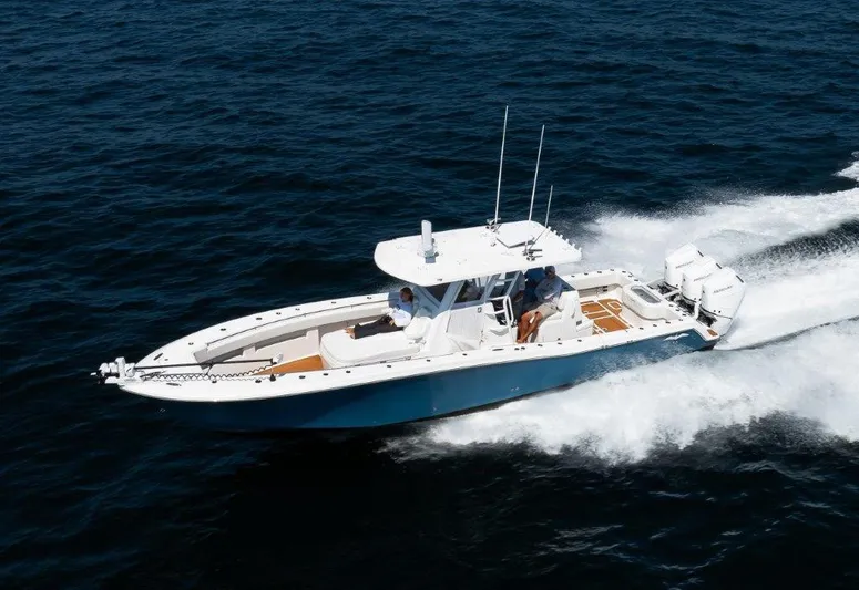  Yacht Photos Pics 2023 Invincible 36 Open boat cruising on open water.