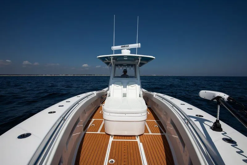  Yacht Photos Pics 2023 Invincible 36 Open boat on open water, featuring sleek design and spacious deck.