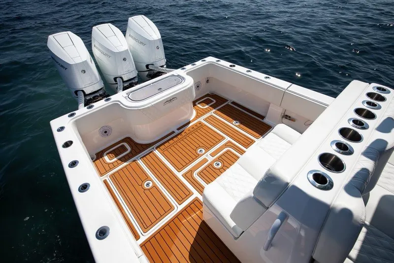  Yacht Photos Pics 2023 Invincible 36 Open boat with triple Mercury engines and teak deck.