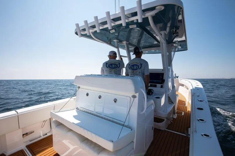  Yacht Photos Pics 2023 Invincible 36 Open boat cruising on the ocean.