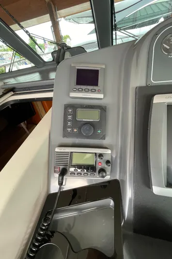  Yacht Photos Pics Control panel of a 2002 Pursuit 3800 Express boat with navigation equipment.