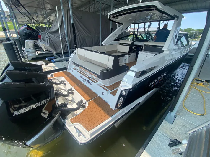  Yacht Photos Pics 2022 Monterey 385 Super Sport boat docked with Mercury engines.