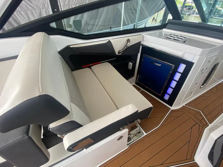  Yacht Photos Pics 2022 Monterey 385 Super Sport interior with sleek seating and modern dashboard design.