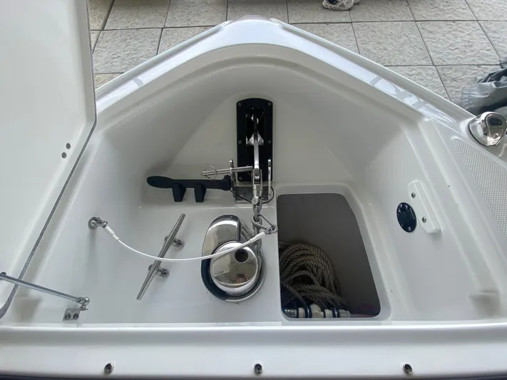  Yacht Photos Pics 2022 Monterey 385 Super Sport anchor compartment with rope storage and stainless steel fittings.