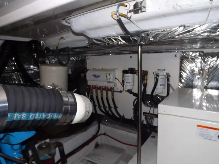  Yacht Photos Pics Engine room of 2007 Tiara Yachts 3600 Sovran with mechanical components and wiring.