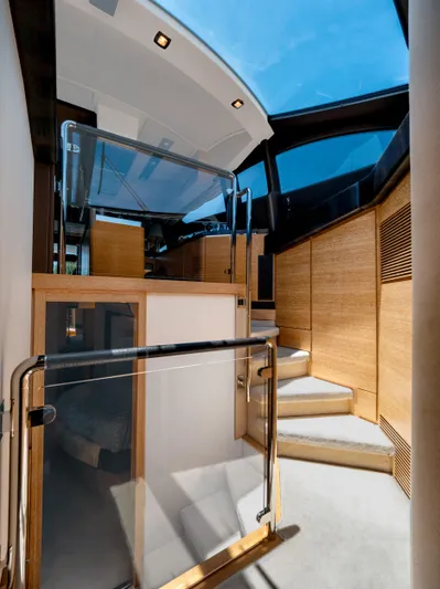  Yacht Photos Pics Interior view of 2013 Azimut 64 yacht with modern design and wooden accents.
