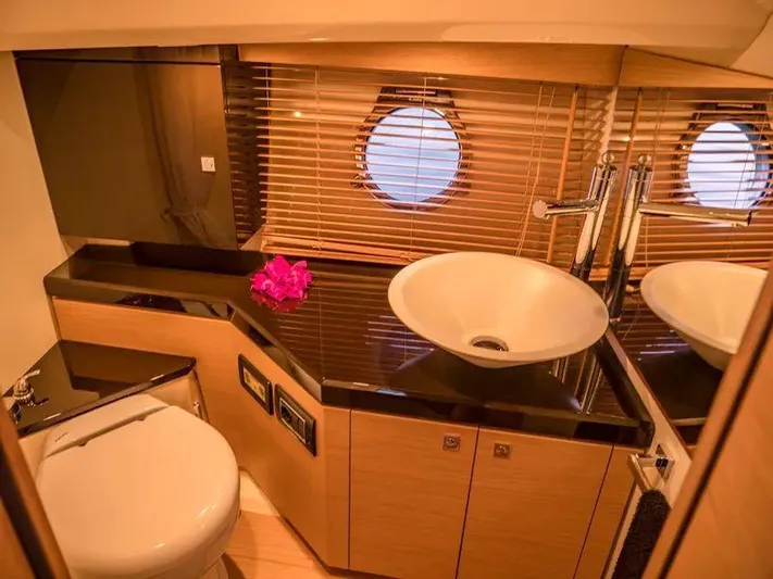  Yacht Photos Pics Luxurious bathroom in 2013 Sessa Marine Key Largo 36 yacht with modern fixtures.