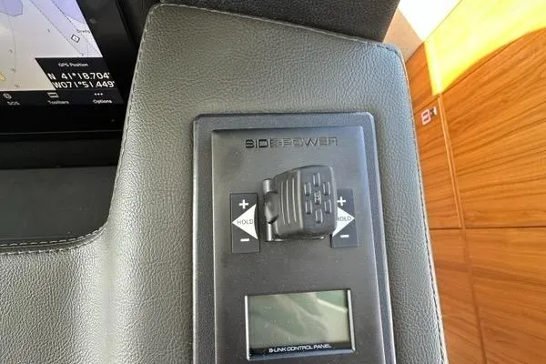 Happy Ours Yacht Photos Pics Control panel of a 2019 Riviera 5400 Sport Yacht with navigation display.