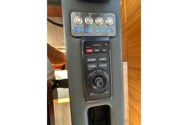 Happy Ours Yacht Photos Pics Control panel of 2019 Riviera 5400 Sport Yacht with Garmin navigation system.