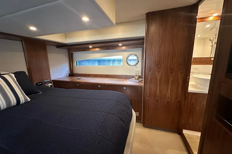 Happy Ours Yacht Photos Pics Luxurious 2019 Riviera 5400 Sport Yacht bedroom with elegant wood finishes and modern design.