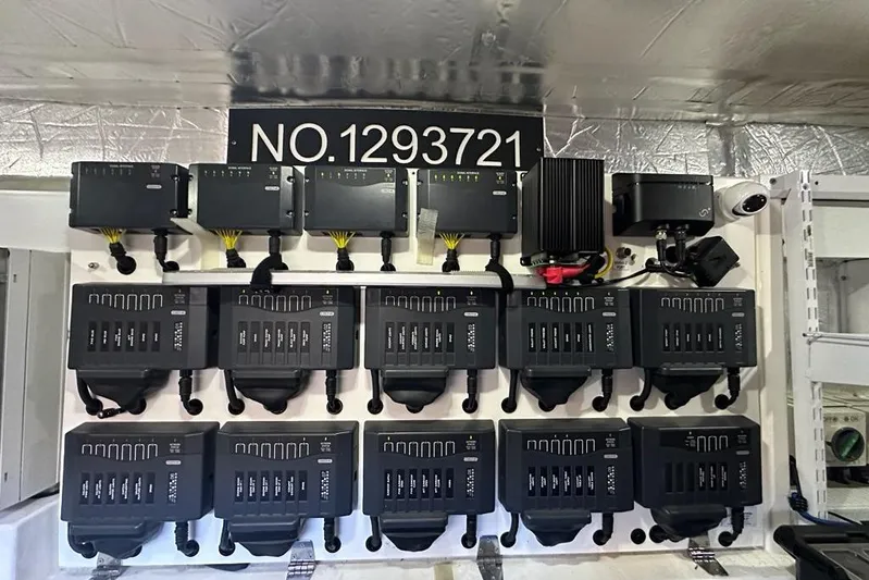 Happy Ours Yacht Photos Pics Electrical panel on a 2019 Riviera 5400 Sport Yacht, featuring multiple control units.