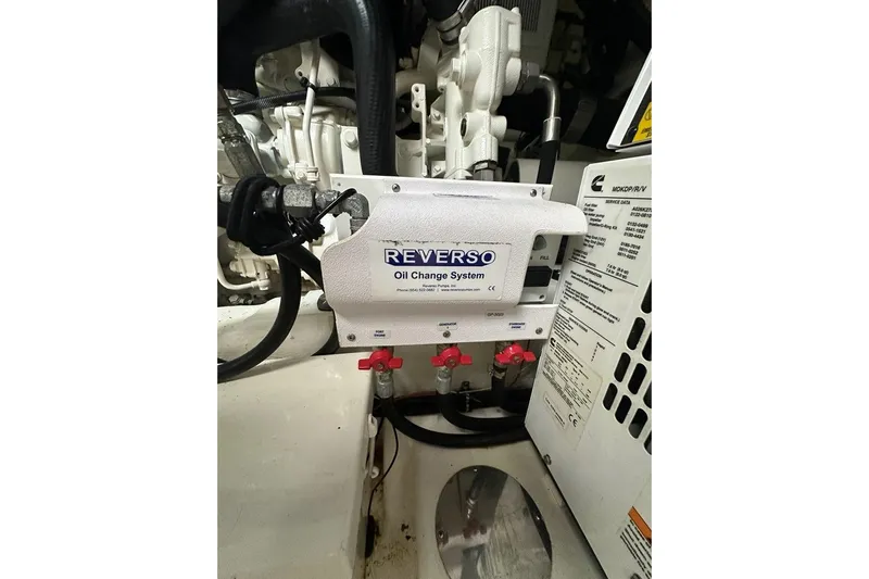 Happy Ours Yacht Photos Pics Reverso oil change system in 2019 Riviera 5400 Sport Yacht engine room.