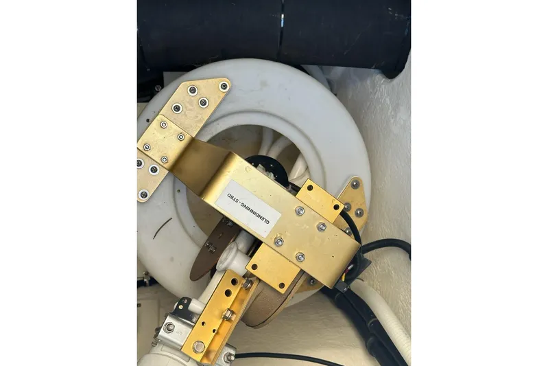 Happy Ours Yacht Photos Pics Engine component of 2019 Riviera 5400 Sport Yacht, featuring metallic and plastic parts.