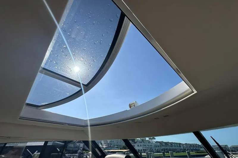Happy Ours Yacht Photos Pics Sunlight through the sunroof of a 2019 Riviera 5400 Sport Yacht.