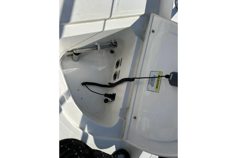 Happy Ours Yacht Photos Pics 2019 Riviera 5400 Sport Yacht deck detail with caution label and equipment.